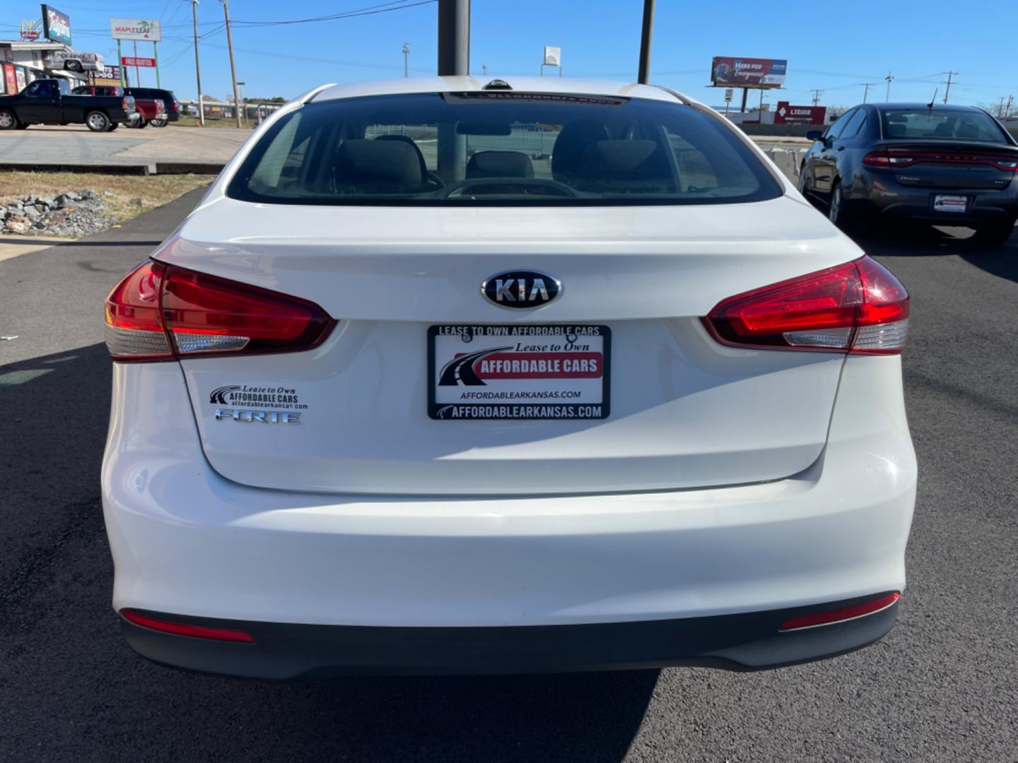 2017 White Kia Forte (3KPFK4A7XHE) with an 4-Cyl, 2.0 Liter engine, Automatic, 6-Spd transmission, located at 8008 Warden Rd, Sherwood, AR, 72120, (501) 801-6100, 34.830078, -92.186684 - Photo#6